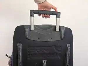 Stuck Luggage Handle Lubrication