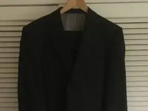 Repair cigarette burn holes in formal suit