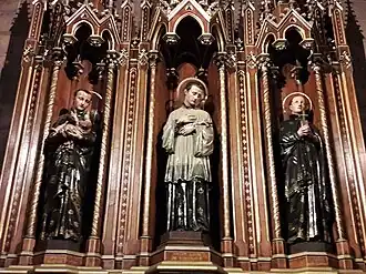 Statues of Jesuit saints Aloysius Gonzaga (fr: Louis Gonzague), Jan Berchmans et Stanislas Kostka in St Sculpture in the church