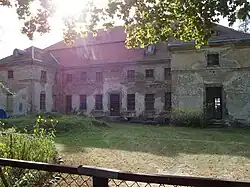 Dilapidated manor in the village