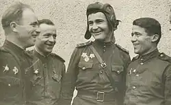 Kosmodemyansky (second from right) with comrades in East Prussia, 4 January 1945.