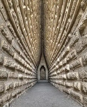 Image 5 Royal Kurgan Photograph: Anatoly Shcherbak The Royal Kurgan is a 4th century BC kurgan (burial barrow) located near present-day Kerch, Crimea. The mound is almost 20 metres high and its base perimeter is about 250 metres. It holds a burial chamber with a square floor plan which gradually merges into the circular shape of a corbelled dome ("false vault"). It is assumed that the Royal Kurgan was the final resting place of a ruler of the Bosporan Kingdom. More selected pictures