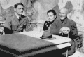Soong sitting close to Chiang opposite Claire Lee Chennault.