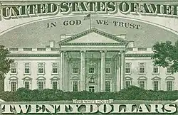 "IN GOD WE TRUST" as it appears on the reverse of a United States twenty-dollar bill, above the White House