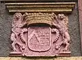 Coat of arms at gate to Schloss Mühlenburg