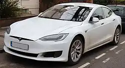 A front three-quarters view of a white 2016 Tesla Model S