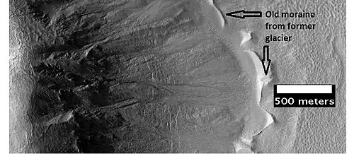 Gullies with remains of a former glacier in crater in Terra Sirenum, as seen by HiRISE under HiWish program. Location is the Phaethontis quadrangle.
