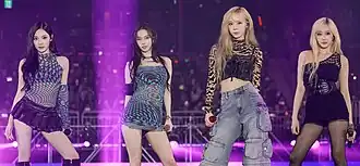 Aespa posing at their K-Link festival performance in 2024