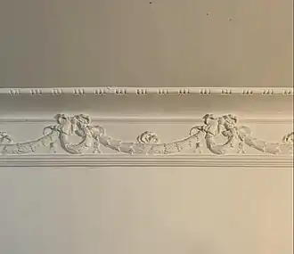 Art Nouveau frieze with festoons, bordered at the top by a bead and reel strip, in Calea Dorobanților no. 50A, Bucharest, Romania, unknown architect or sculptor, c.1900