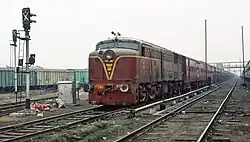 A broad gauge class WDM-1 locomotive with an evening train at Gorakhpur Junction in December 1993