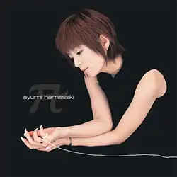 An image of Ayumi Hamasaki sitting down in a black backdrop, merging with her black dress. She features dark-red hair in a crop hairstyle, with a long piece of digitally-altered string on her hand with the song and artist title on the left.