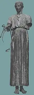 A Greek charioteer from Delphi wearing a long chiton, ca. 470 BC