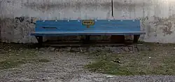 A derelict cement bench at the Barhan station platform