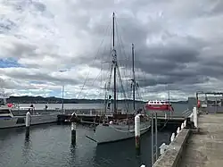 boat on a waterfront on a grey day.