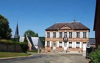 The church and town hall in Achy