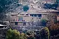A mud brick house on a mountainside - a common sight in the hilly areas of the Afghan countryside