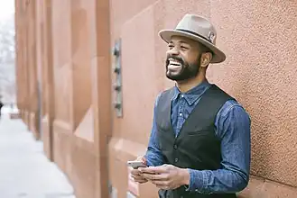 Man wearing fedora hat, 2017.