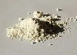 Photo of a sample of ammonium vanadate