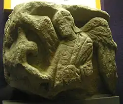 Worn relief of an angel from St Mary's Church, Reculver in Kent