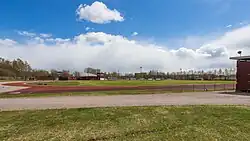 a grass field of a sport complex