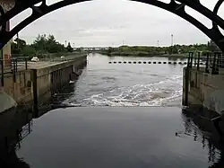 View through the north gate of Tees Barrage showing fish pass entrance (centre left) and monitoring camera (right)