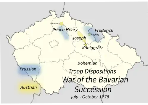 An outline map of 20th century Czechoslovakia includes most of Bohemia; the positions of the armies are marked in yellow and blue, showing Joseph's army (yellow) in a line of fortifications and surrounded at front and rear by Henry and Frederick (blue).