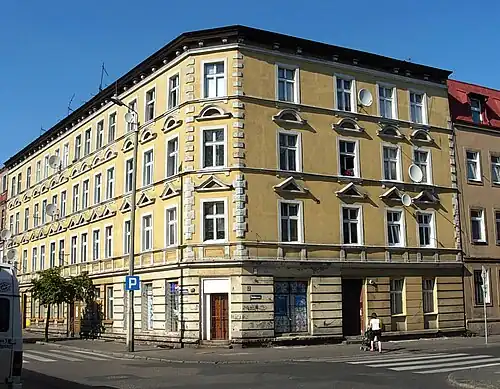 View of the tenement from the street crossing