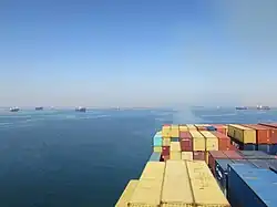 Northbound convoy waits in the Great Bitter Lake as southbound convoy passes, October 2014