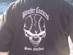 A black shirt with a skull in the middle with the text "Bleacher Creatures" on top and "Bronx, New York" below.