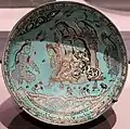 Bowl with Majlis scene by a pond, by Abu Zayd, Iran, dated 1186, MMA.[152]