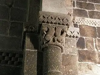 Capital at Church of Bravães with dragons.