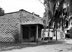 Brick building along the commercial strip, November 1946