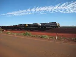 The Rio Tinto Mining Company in Western Australia runs the world's largest network of driverless trains, with 1,700 km (1,100 mi) of freight railways run by an increasing number of completely unattended trains.