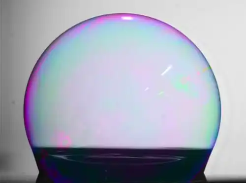 A soap bubble wetting an ultrahydrophobic surface