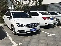 Pre-facelift Buick Excelle GT sedans front and rear.