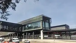 Bus transfer stations connected by pedestrian bridges.