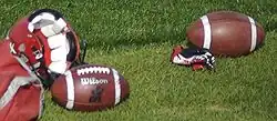 Image 31Footballs and a helmet at a Calgary Stampeders (CFL) team practice (from Canadian football)