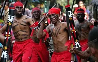 Cakalele dancers wearing traditional clothes