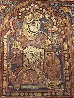Sicily, c. 1140 AD. Lute family instrument or rubab. Not clear whether wood or leather top; both rubab and lute style soundholes.
