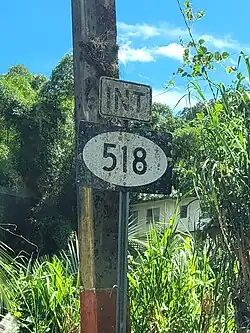 PR-123 south near PR-518 intersection in downtown Adjuntas