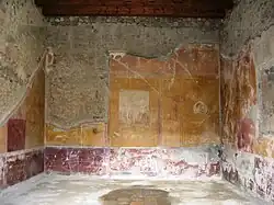 Photograph of Roman ruins, painted with big blocks of yellow colour.