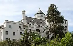 View of the Chateau Marmont hotel from a lower vantage point, showing the full structure of the building
