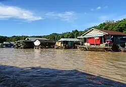 Houses along the waterfront in Chong Khneas, Siem Reap Province, Cambodia.