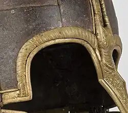 Central and right brow dragon head on the Coppergate Helmet (8th century)