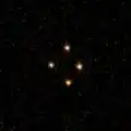 Quadruple image of the quasar taken with Hubble Space Telescope.