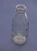 Reusable glass milk bottle