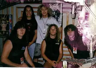 Death in 1989, from left to right: Terry Butler, Paul Masvidal, manager Eric Greif, Bill Andrews, and Chuck Schuldiner