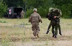 Members of the regiment training with dogs.