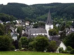 View of Drolshagen towards south from Papenberg (417 m). St. Clement's Church dominates the skyline.