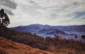 Fresh snowfall in Dudhatoli hills, as seen from Gairsain